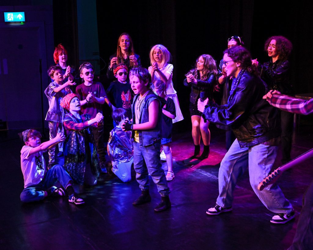 Theatrical performance with diverse characters.