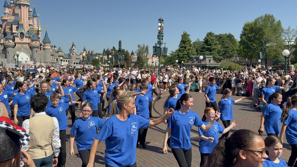 Group of HKPA dancers performing in Disneyland parade